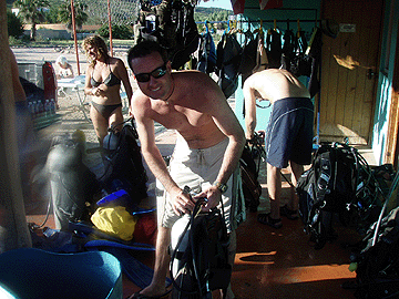 Jon assembles all of the gear in preparation for his first scuba dive.